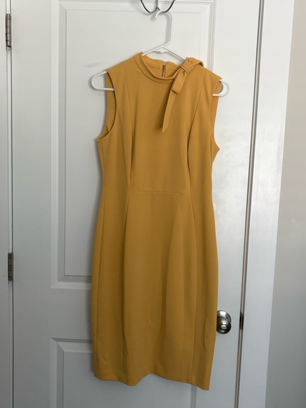 Calvin Klein Sleeveless Bow-Accent Midi Dress in Mustard